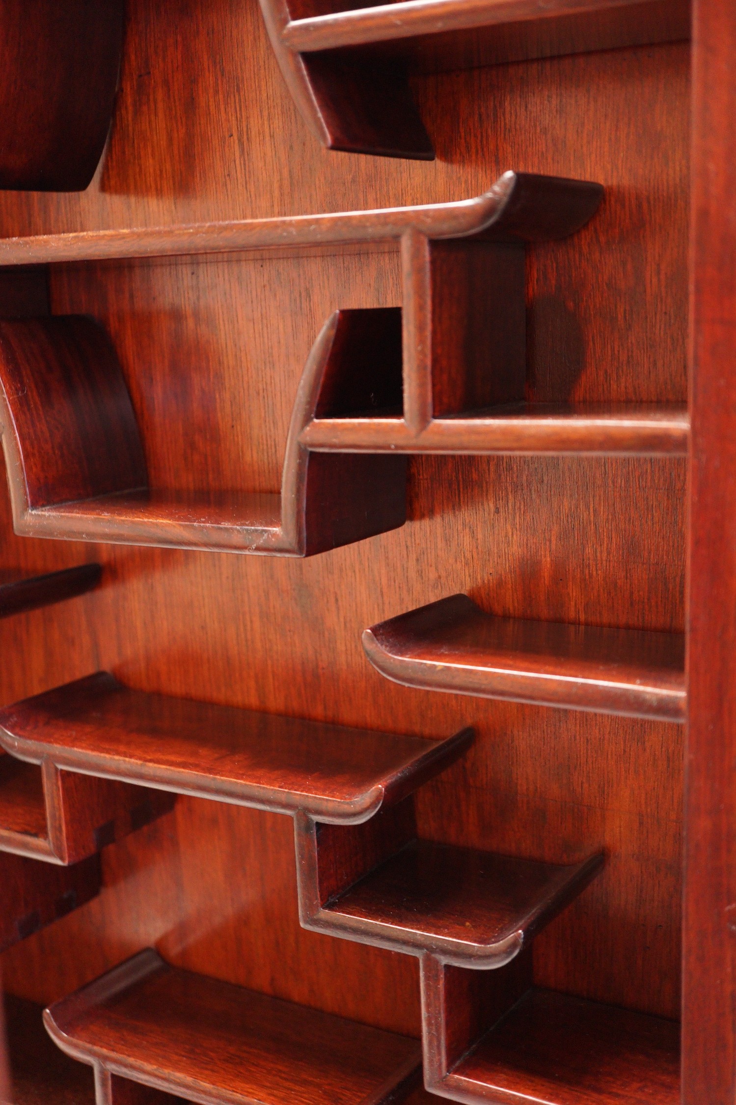 A Chinese hongmu and hardwood snuff bottle cabinet, 63x40x10cm